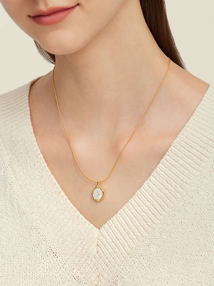 Cyrielle Gold Oval Shell Carving Necklace